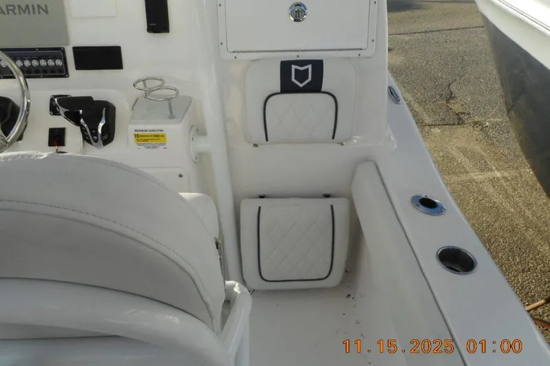 Slide: The Image of Interior view of 2026 Sea Fox 248 Side Console boat with seating and controls. - 6