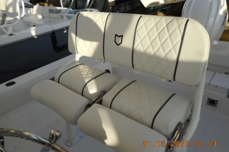 Slide: The Image of Luxurious seating on 2026 Sea Fox 248 Side Console boat, featuring quilted upholstery. - 9