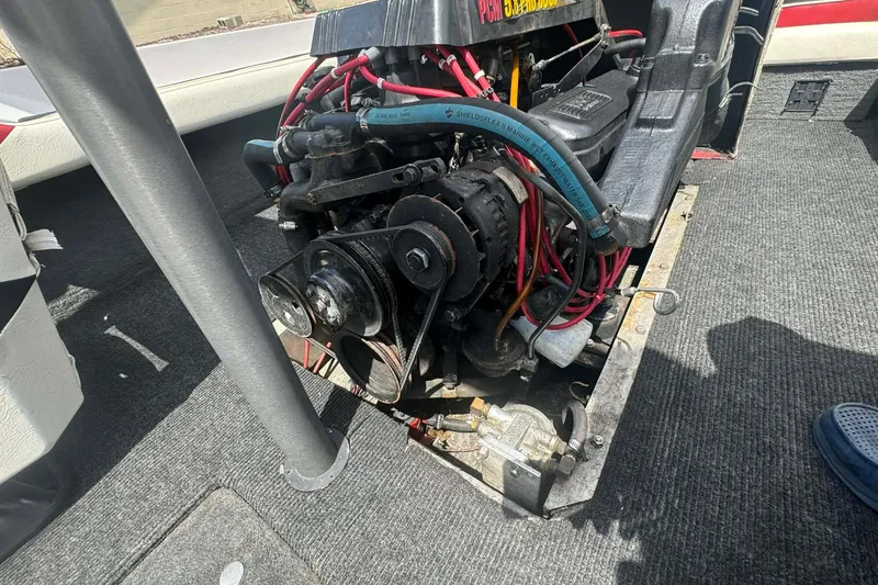 Slide: The Image of Engine of a 1992 Nautique Ski Nautique 200 Closed Bow boat, showcasing mechanical components. - 9