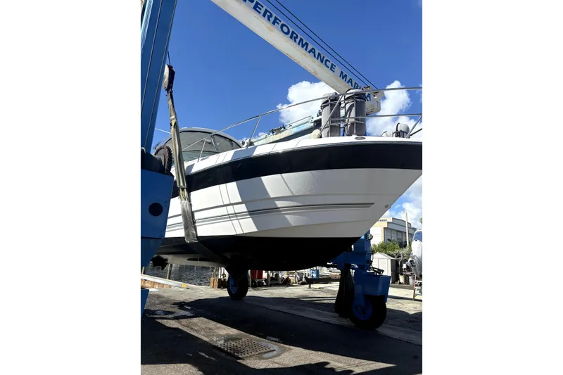 Slide: The Image of 2018 Monterey 355 Sport Yacht docked at marina, side view. - 3