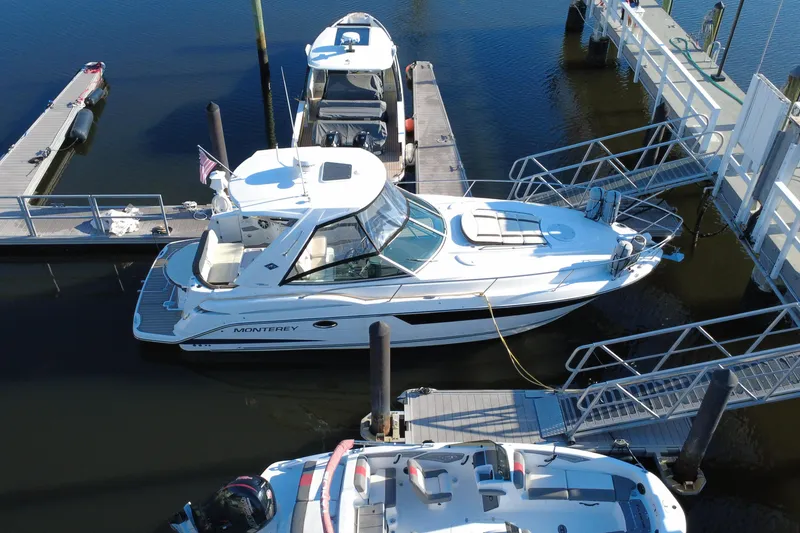 Slide: The Image of 2018 Monterey 355 Sport Yacht docked at marina, aerial view. - 5