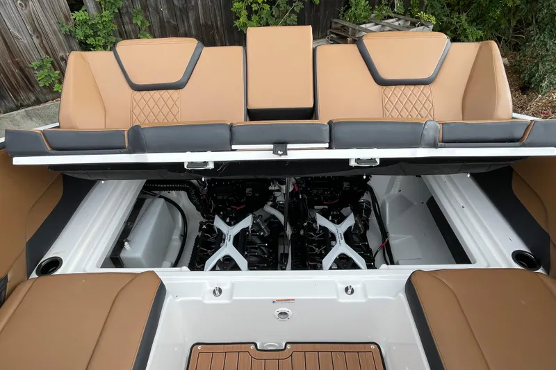 Slide: The Image of 2026 Yamaha Boats 252SD engine compartment with tan seating and dual engines visible. - 17