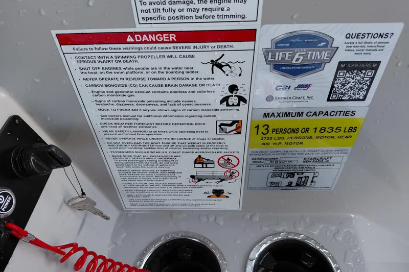 Slide: The Image of Safety warnings and capacity limits on a 2026 Starcraft RX 23 Q DH boat. - 21