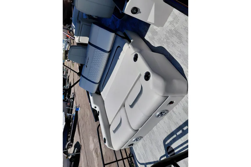 Slide: The Image of Luxurious seating on 2026 Starcraft RX 23 Q DH boat, featuring sleek design and comfort. - 26