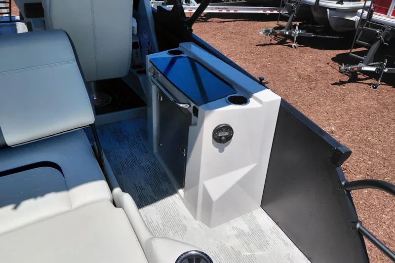 Slide: The Image of Interior of 2026 Starcraft RX 23 Q DH boat with seating and control panel. - 30