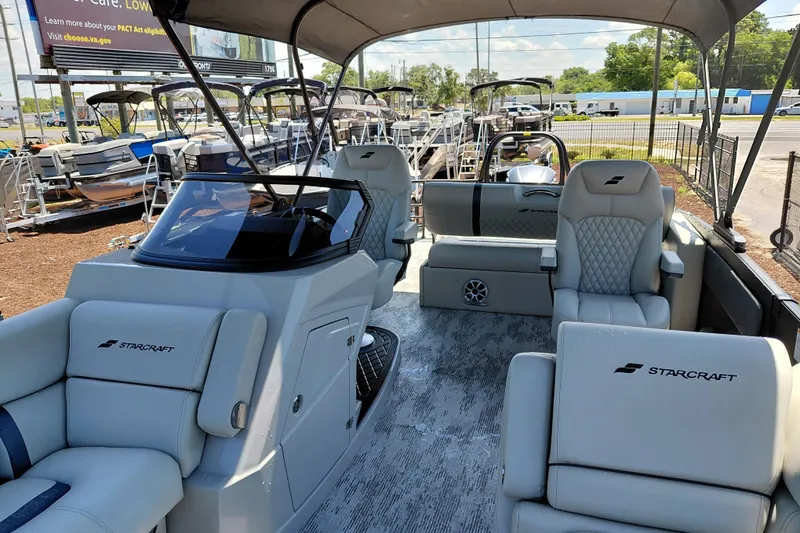 Slide: The Image of 2026 Starcraft RX 23 Q DH boat interior with luxurious seating and modern design. - 35