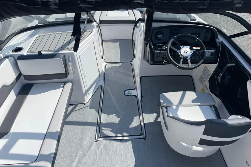 Slide: The Image of 2026 Yamaha Boats AR195 interior with sleek seating and modern steering console. - 5