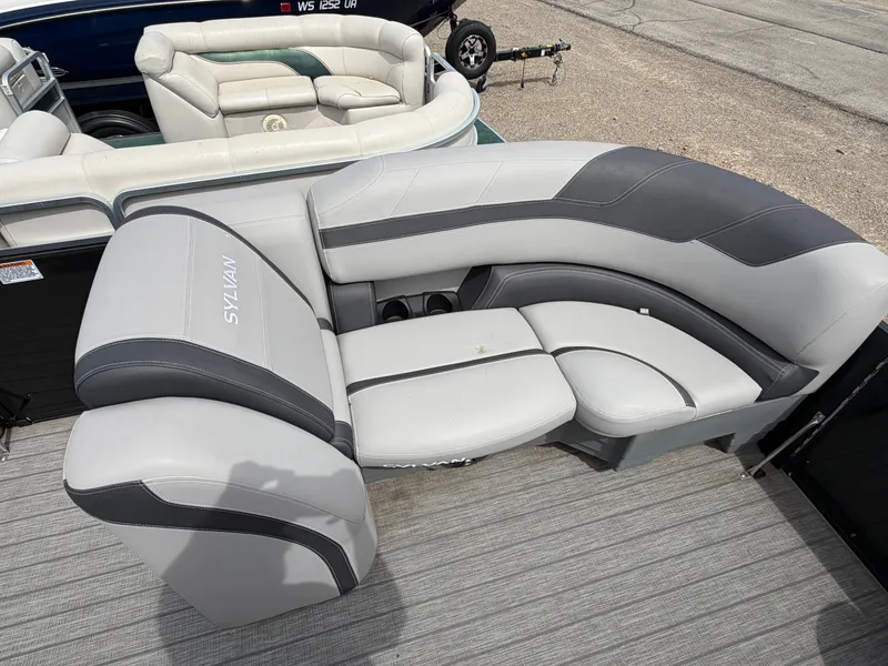 Slide: The Image of Sylvan L3 RLZ 2022 pontoon boat with gray leather seating. - 5