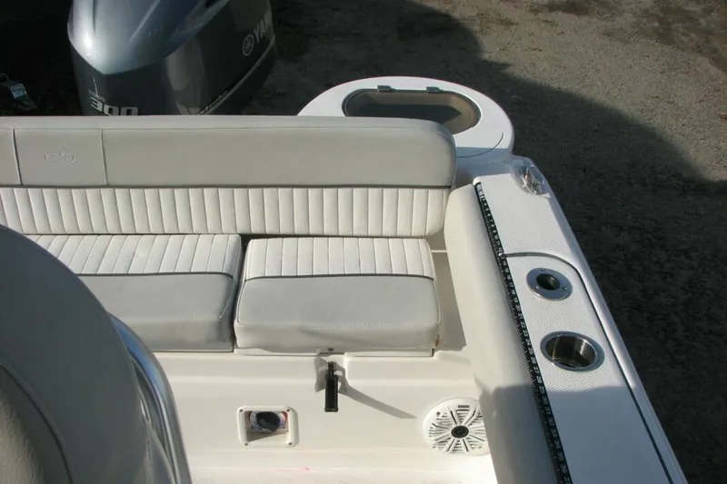 Slide: The Image of 2020 Sea Fox 249 Avenger boat interior with cushioned seating and Yamaha engine. - 5