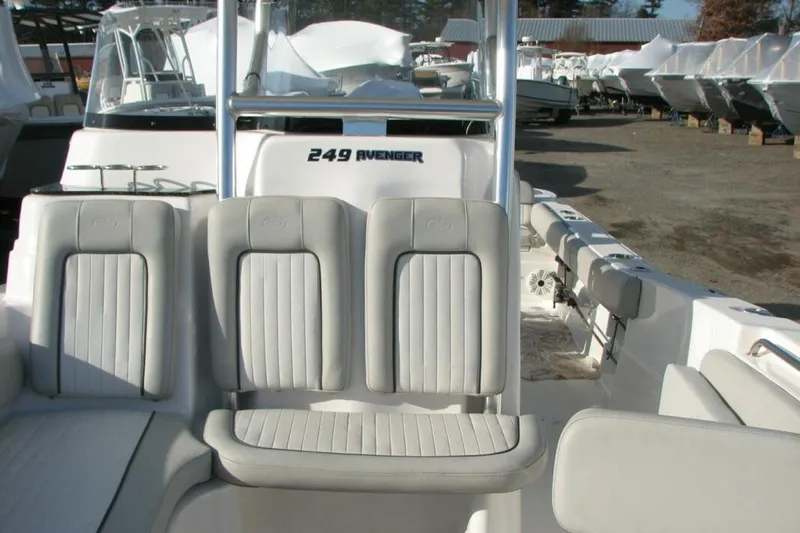 Slide: The Image of 2020 Sea Fox 249 Avenger boat interior with cushioned seating and sleek design. - 7