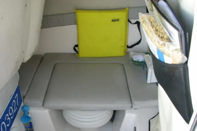 Slide: The Image of 2020 Sea Fox 249 Avenger cabin interior with seating and storage compartments. - 9