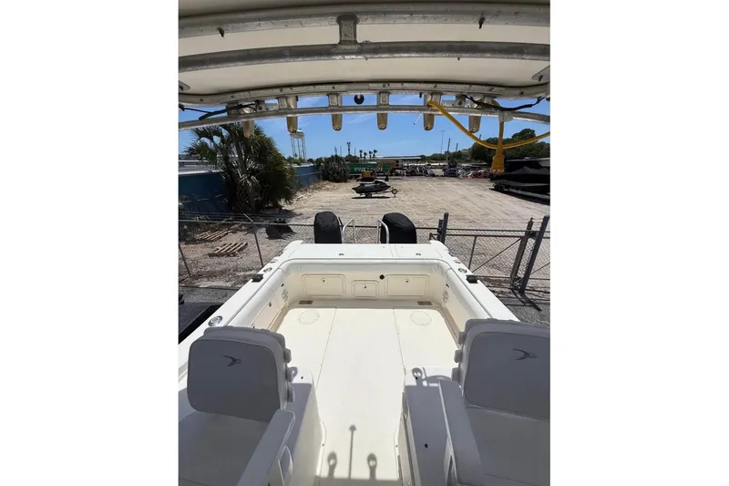 Slide: The Image of 2006 World Cat 270 EC boat interior view at a dockyard. - 5