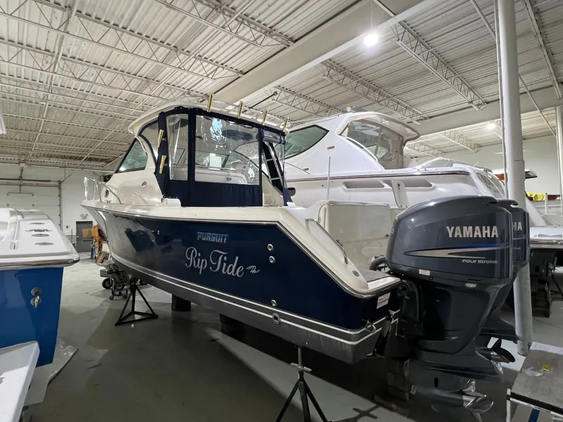 The Image of 2008 Pursuit OS 315 Offshore boat in storage facility - 0