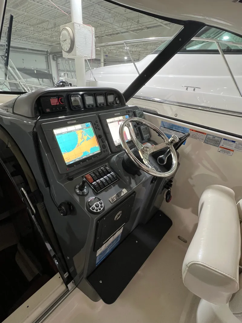 Slide: The Image of Helm of 2008 Pursuit OS 315 Offshore with navigation system. - 22