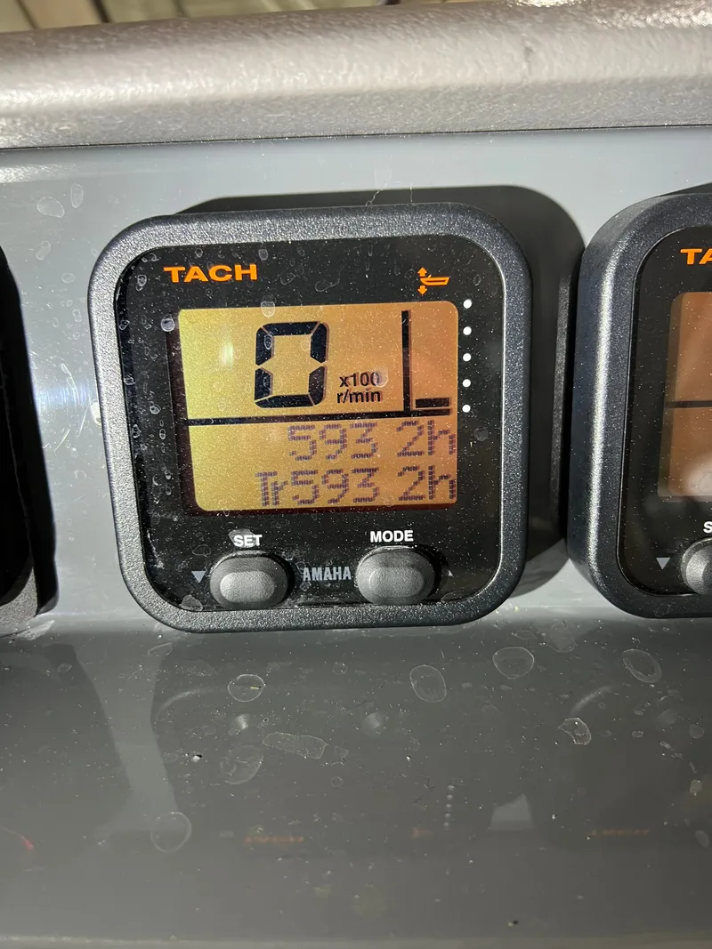 Slide: The Image of Yamaha tachometer on 2008 Pursuit OS 315 Offshore boat. - 24
