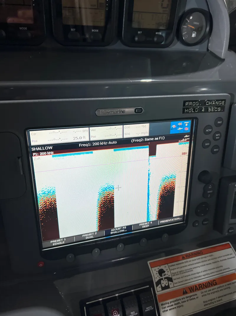 Slide: The Image of Navigation system on a 2008 Pursuit OS 315 Offshore boat. - 26