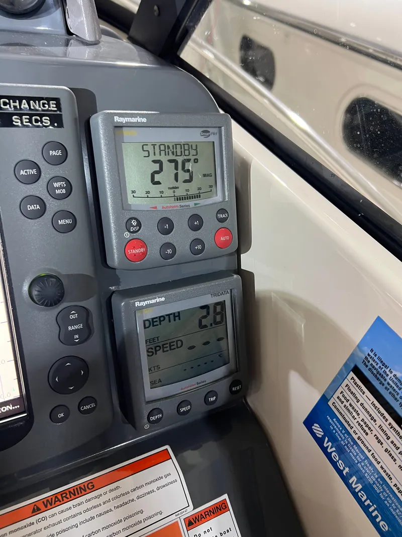 Slide: The Image of Raymarine instruments on 2008 Pursuit OS 315 Offshore boat. - 27