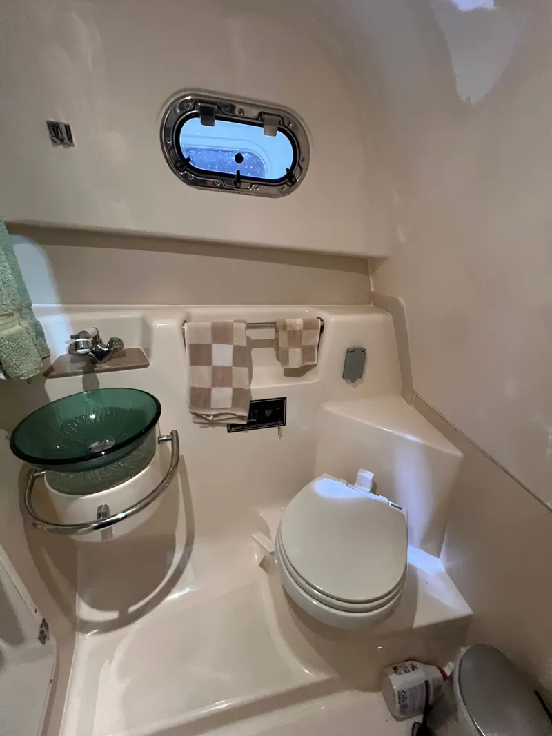 Slide: The Image of Interior of 2008 Pursuit OS 315 Offshore yacht bathroom. - 29