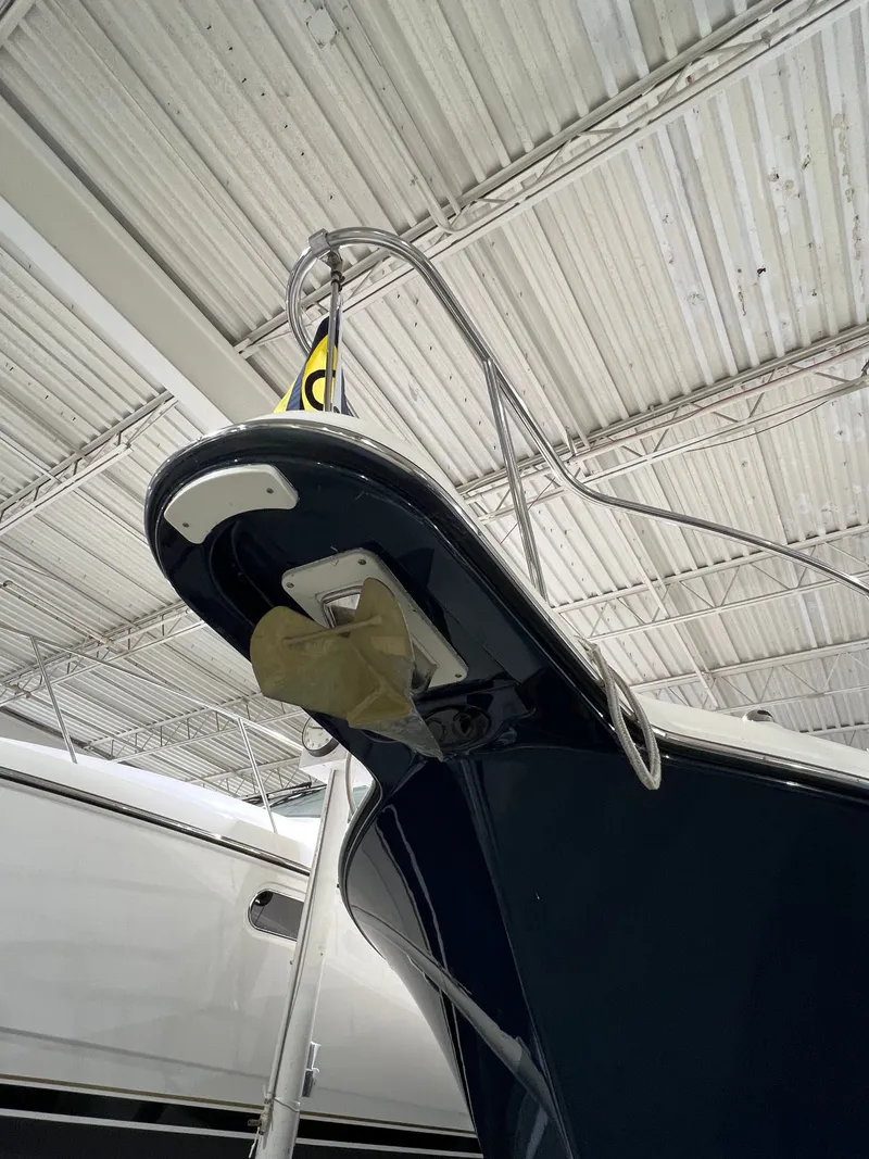 Slide: The Image of 2008 Pursuit OS 315 Offshore boat in warehouse. - 3