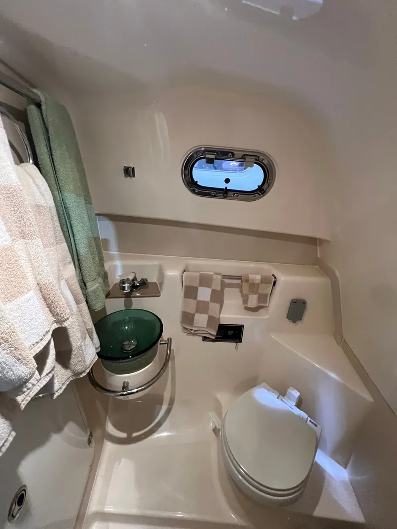 Slide: The Image of Interior of 2008 Pursuit OS 315 Offshore yacht bathroom. - 30