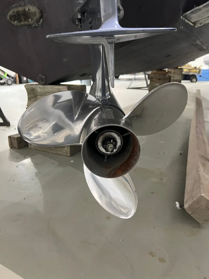 Slide: The Image of Close-up of a 2008 Pursuit OS 315 Offshore boat propeller. - 33