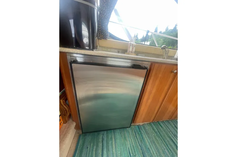Slide: The Image of Stainless steel fridge in 2004 Meridian 341 Sedan yacht kitchen. - 13