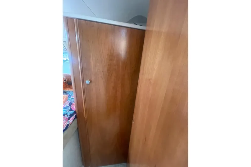 Slide: The Image of Wooden interior door inside 2004 Meridian 341 Sedan yacht cabin. - 22