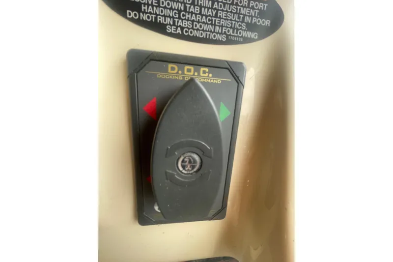 Slide: The Image of Control panel of a 2004 Meridian 341 Sedan boat, featuring docking command system. - 29