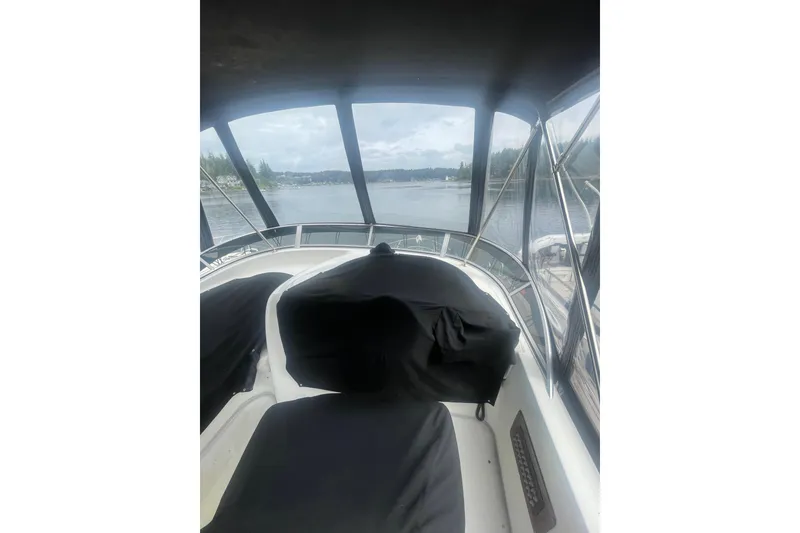 Slide: The Image of 2004 Meridian 341 Sedan boat interior with scenic water view. - 33