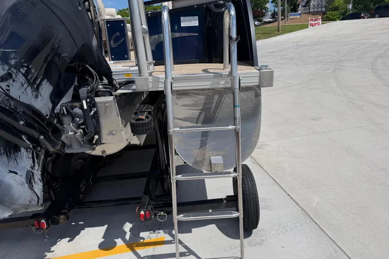 Slide: The Image of 2018 JC 25 Neptoon DSL boat with ladder and motor. - 12