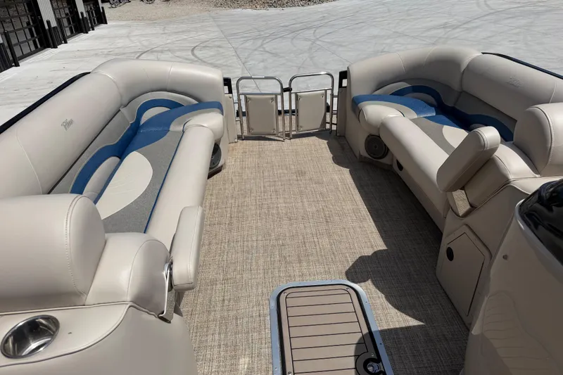 Slide: The Image of Luxurious interior of a 2018 JC 25 Neptoon DSL pontoon boat with plush seating. - 25