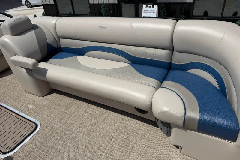 Slide: The Image of 2018 JC 25 Neptoon DSL pontoon boat seating with blue and gray upholstery. - 28