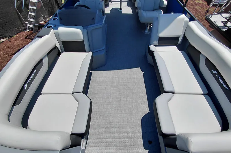 Slide: The Image of Luxurious interior of 2026 Starcraft VX 22 R DH pontoon boat with spacious seating. - 10