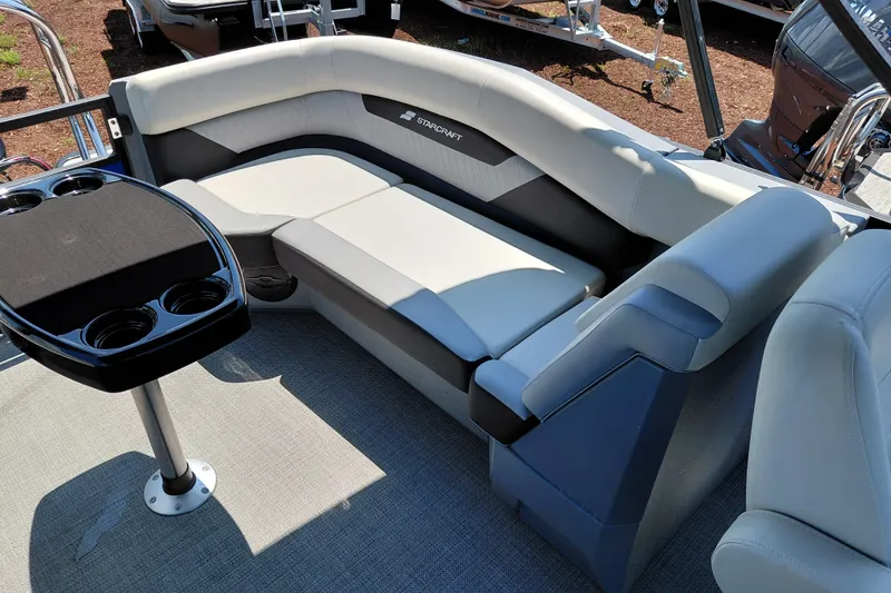 Slide: The Image of Luxurious seating area on 2026 Starcraft VX 22 R DH pontoon boat with cupholders. - 16