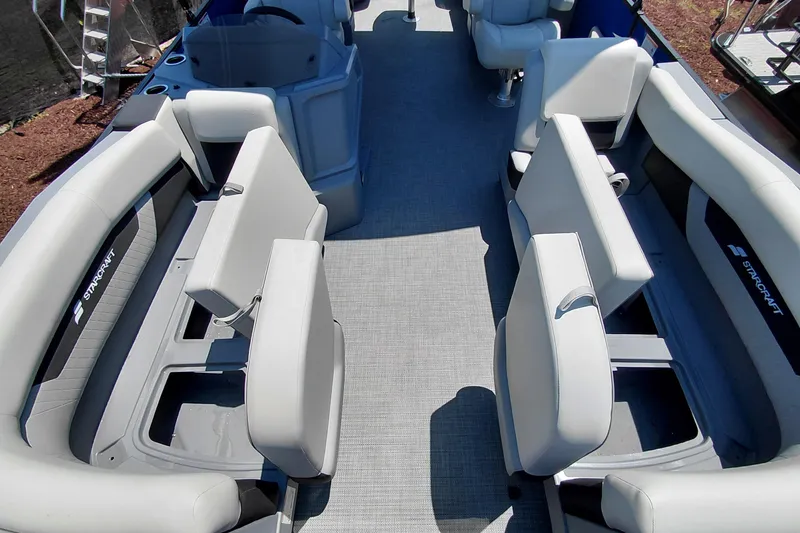 Slide: The Image of 2026 Starcraft VX 22 R DH boat interior with spacious seating and modern design. - 22