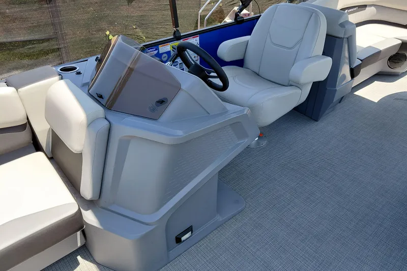 Slide: The Image of Interior of 2026 Starcraft VX 22 R DH boat with modern helm and seating. - 23
