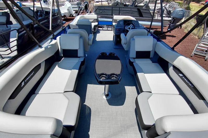 Slide: The Image of 2026 Starcraft VX 22 R DH pontoon boat interior with spacious seating and modern design. - 30