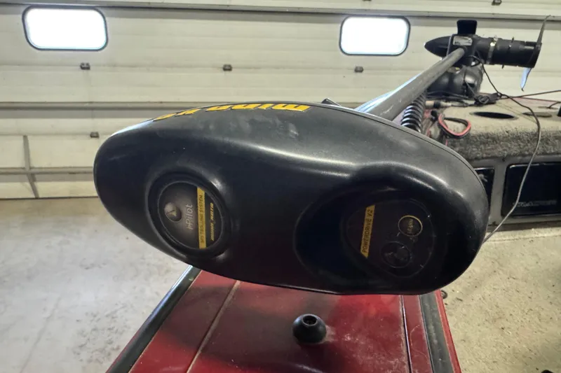 Slide: The Image of Minn Kota trolling motor on 2011 Tracker Targa V-18 Combo boat in garage. - 14