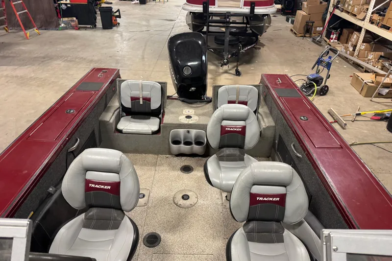 Slide: The Image of 2011 Tracker Targa V-18 Combo boat interior with seating and storage compartments. - 15