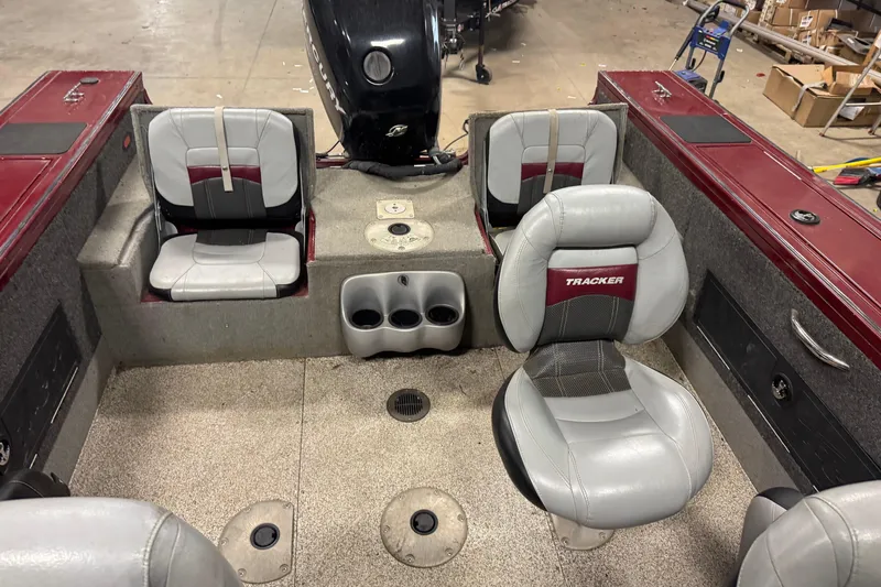 Slide: The Image of 2011 Tracker Targa V-18 Combo boat interior with seating and storage compartments. - 9