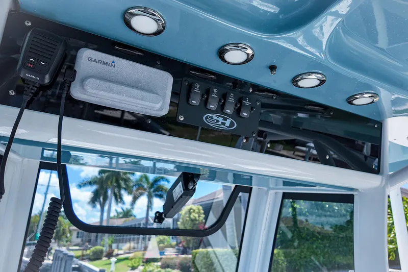 Slide: The Image of 2022 Sea Hunt Gamefish 27 boat console with Garmin electronics and control panel. - 31