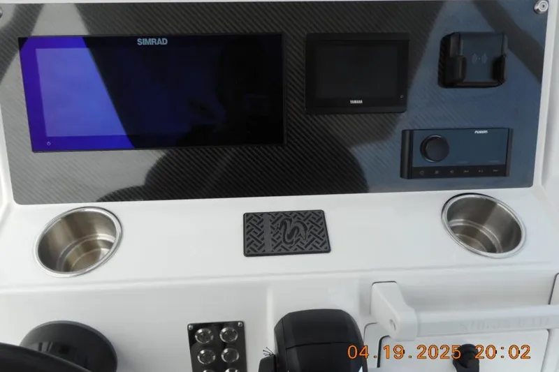 Slide: The Image of Highfield Sport 760 dashboard with Simrad display, 2025 model. - 12