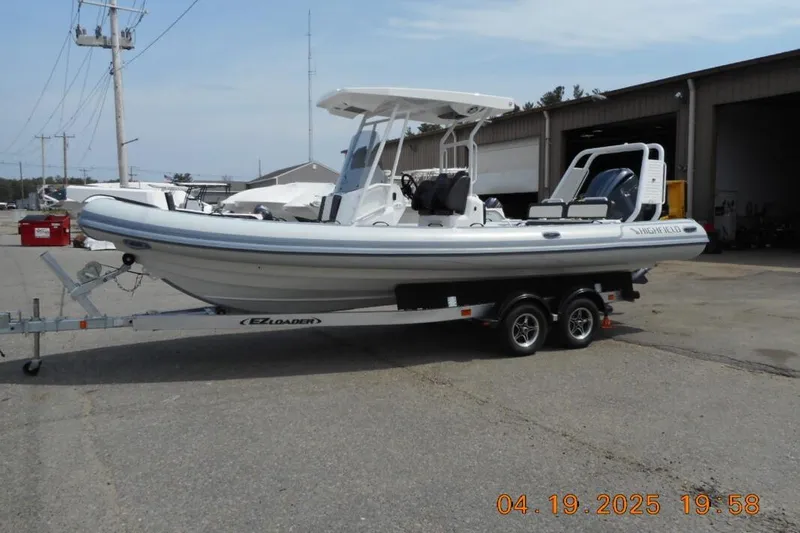 Slide: The Image of 2025 Highfield Sport 760 boat parked on trailer outdoors. - 3
