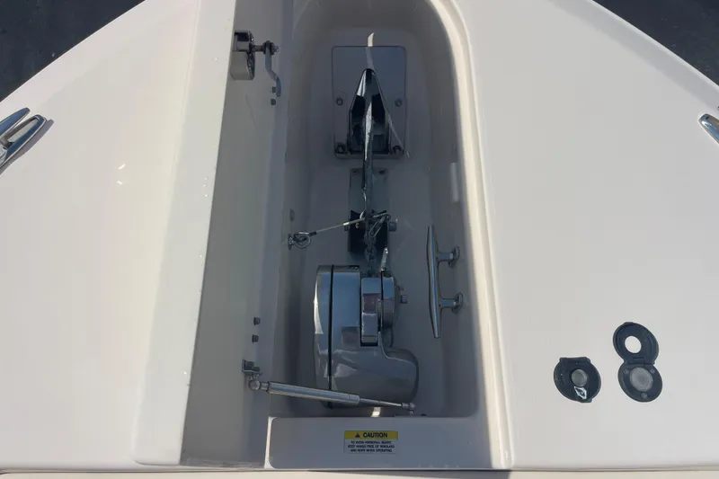 Slide: The Image of 2018 Grady-White Canyon 306 anchor system, featuring stainless steel components and deck fittings. - 14