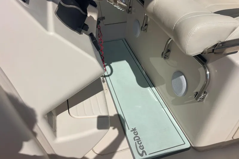 Slide: The Image of Interior of 2018 Grady-White Canyon 306 boat with SeaDek flooring and seating. - 24