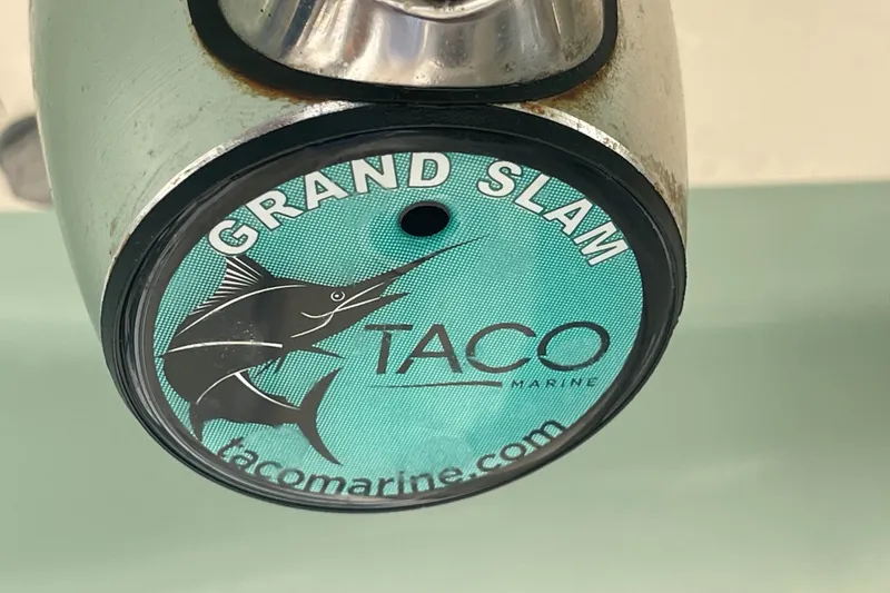 Slide: The Image of TACO Marine Grand Slam logo on a 2018 Grady-White Canyon 306 boat. - 28