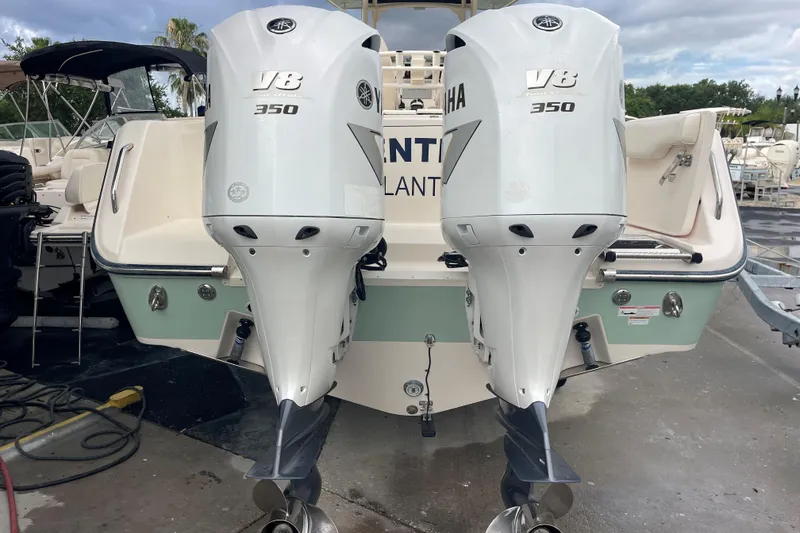 Slide: The Image of 2018 Grady-White Canyon 306 boat with twin Yamaha V8 350 engines. - 4