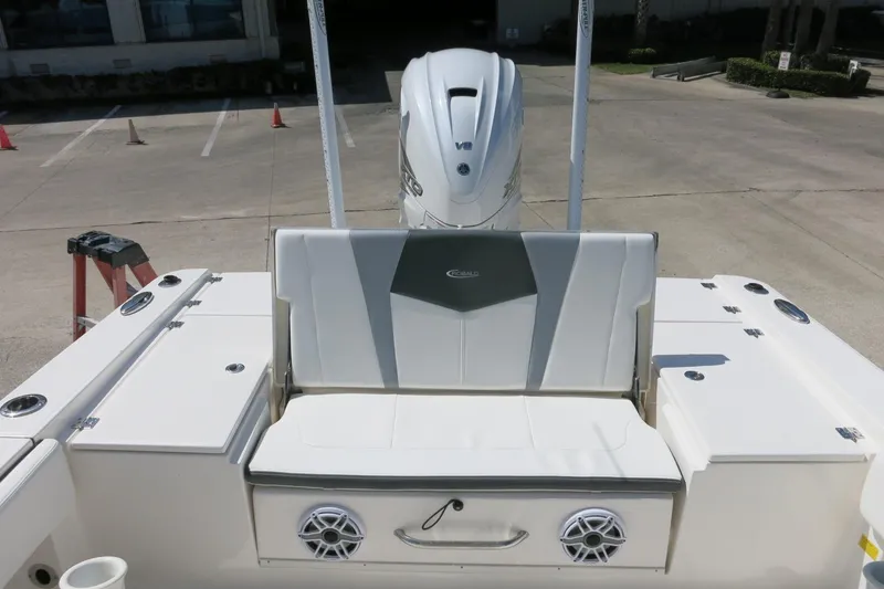 Slide: The Image of 2022 Robalo 266 Cayman boat with seating and Yamaha V8 engine. - 32