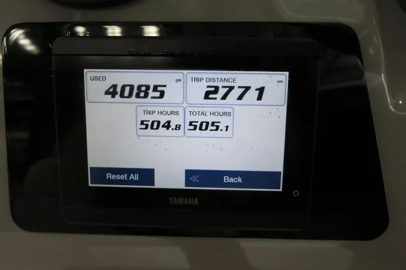 Slide: The Image of Yamaha display showing fuel usage and trip data for 2022 Robalo 266 Cayman. - 39