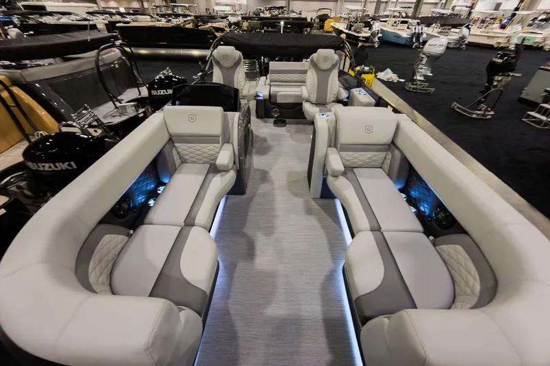 Slide: The Image of Luxurious interior of 2026 Godfrey Monaco 235 pontoon boat with plush seating and ambient lighting. - 5